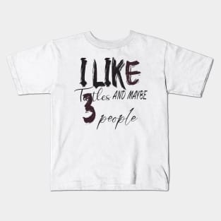 like turtles and maybe 3 people Kids T-Shirt